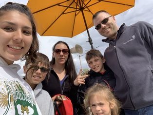 Teicher family photo with yellow umbrella